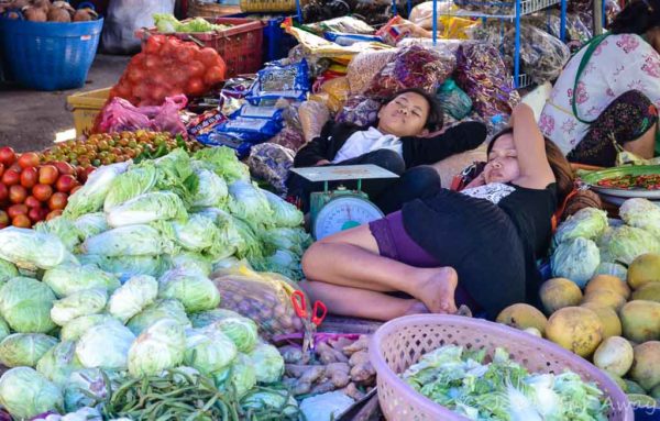 Sleepy market sellers, Luang Prabang, Laos