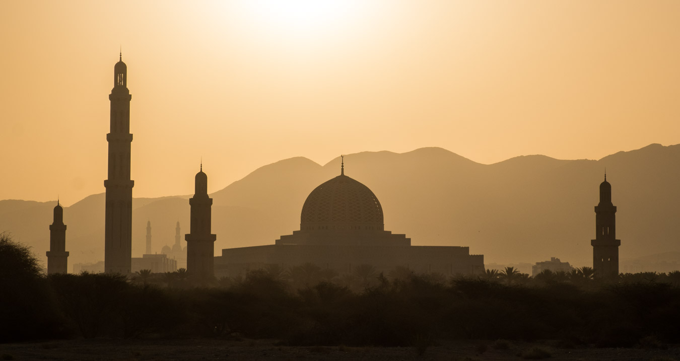 The sun rising over Sultan Qaboos Grand Mosque in Muscat